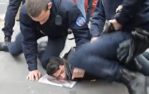 2 French policemen attack a peaceful protester against gay marriage